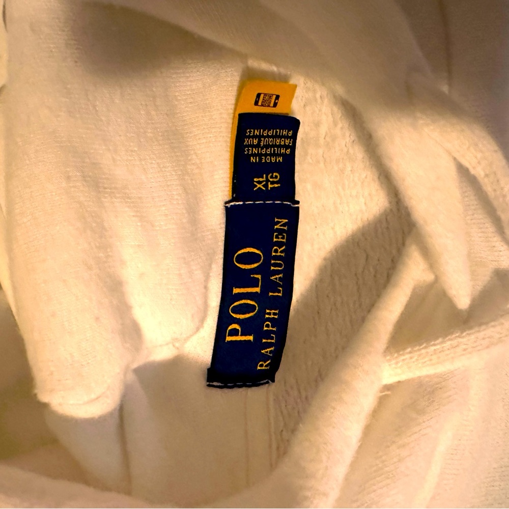 White / Tie die Polo Ralph Lauren pull over hoodie with paint spattered design.